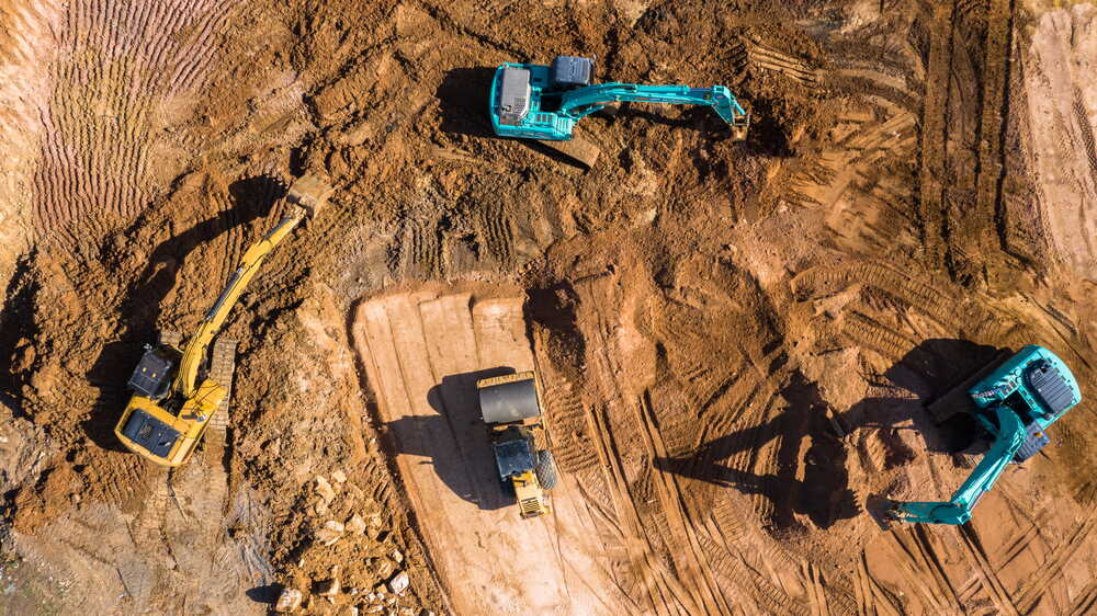 Aerial drone survey of excavators working on a civil engineering earthworks project